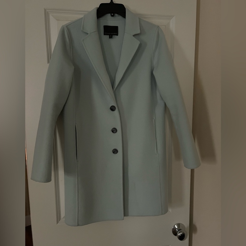 Beautiful soft blue felt coat..extra small but runs big